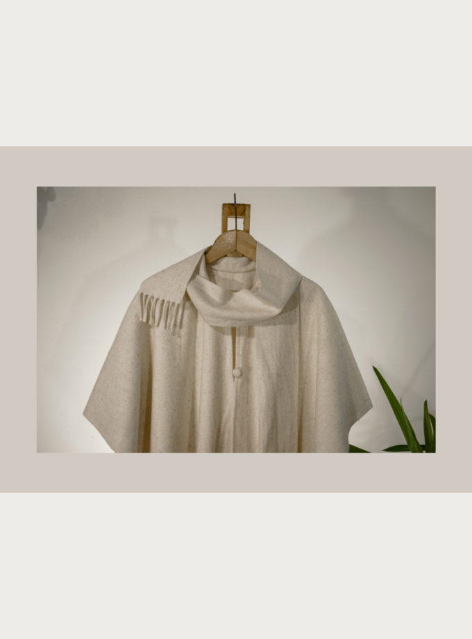 Oaxacan raw wool poncho with fringed edges, attached scarf and covered wool buttons