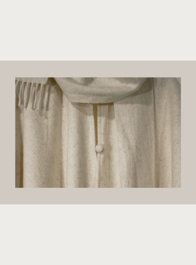 Oaxacan raw wool poncho with fringed edges, attached scarf and covered wool buttons